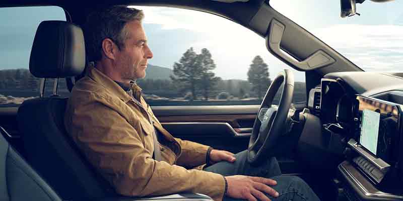 A driver sitting in the interior of the 2025 Chevrolet Silverado 1500 in Bakersfield, CA