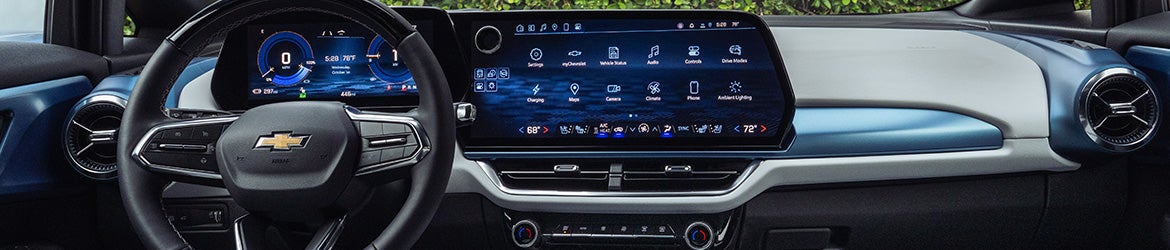 2026 Chevrolet Equinox EV dashboard in Bakersfield showcasing the 17.7-inch touchscreen, digital gauge cluster, and connectivity features for navigation and media.