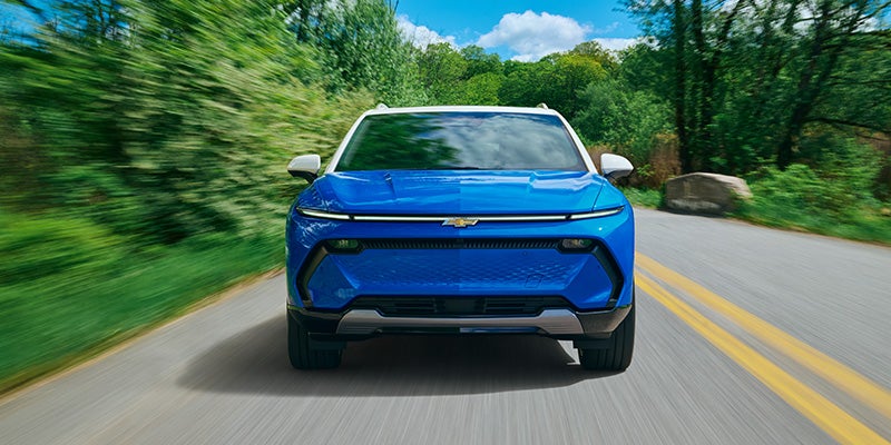 2026 Chevrolet Equinox EV in Bakersfield on local highways demonstrating 220 hp front-wheel drive, 300 hp all-wheel drive, and efficient electric range for city and freeway driving.