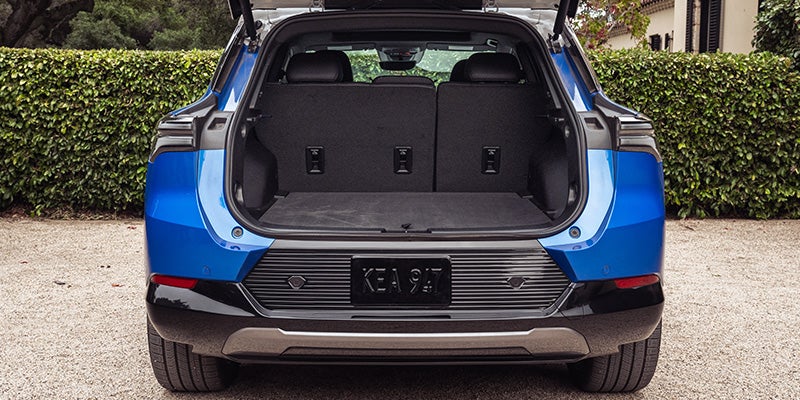 Chevrolet Equinox EV rear cargo area in Bakersfield with 26.4 cubic feet behind the rear seats and 57.2 cubic feet with seats folded for maximum storage.